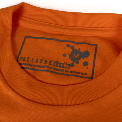 Stunt Vs. Genesis Knockout Tee - Orange